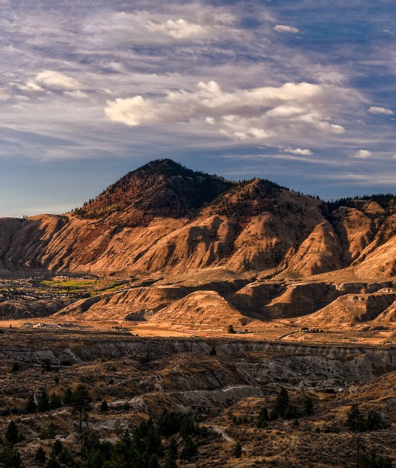 Mount Peter and Paul in Kamloops with the light hitting the BC mountain peaks.