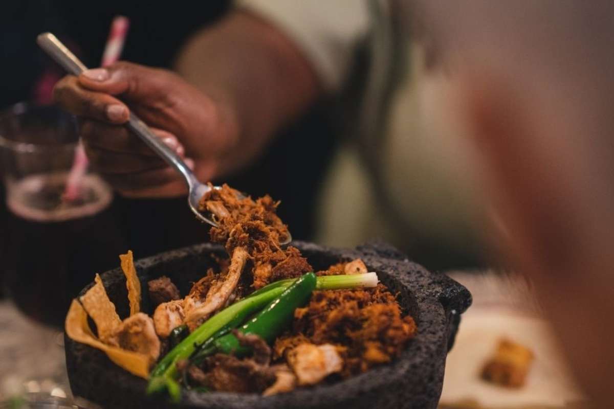 mexican cuisine in a hot stone dish