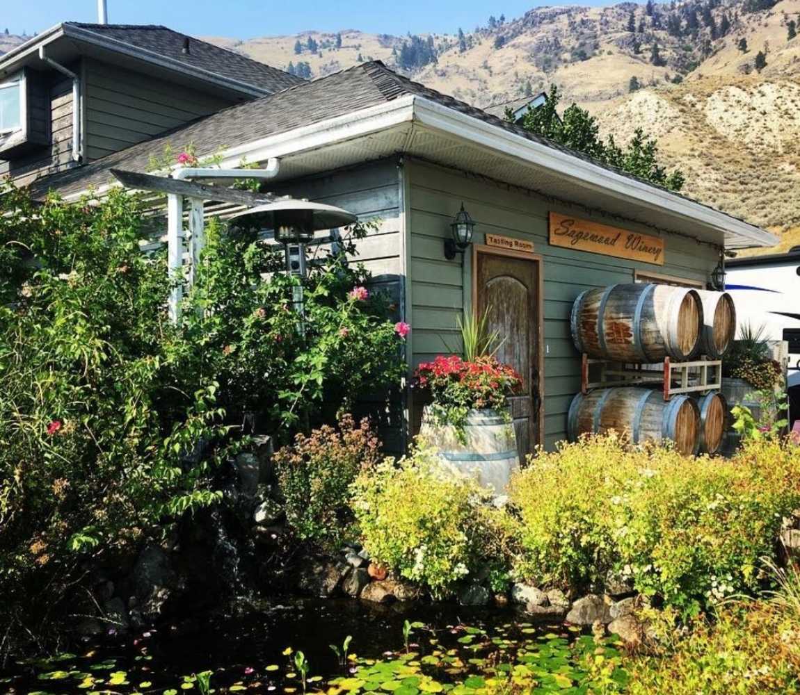 Tasting room building of Sagewood Estate Winery amongst the hoodoos in Kamloops