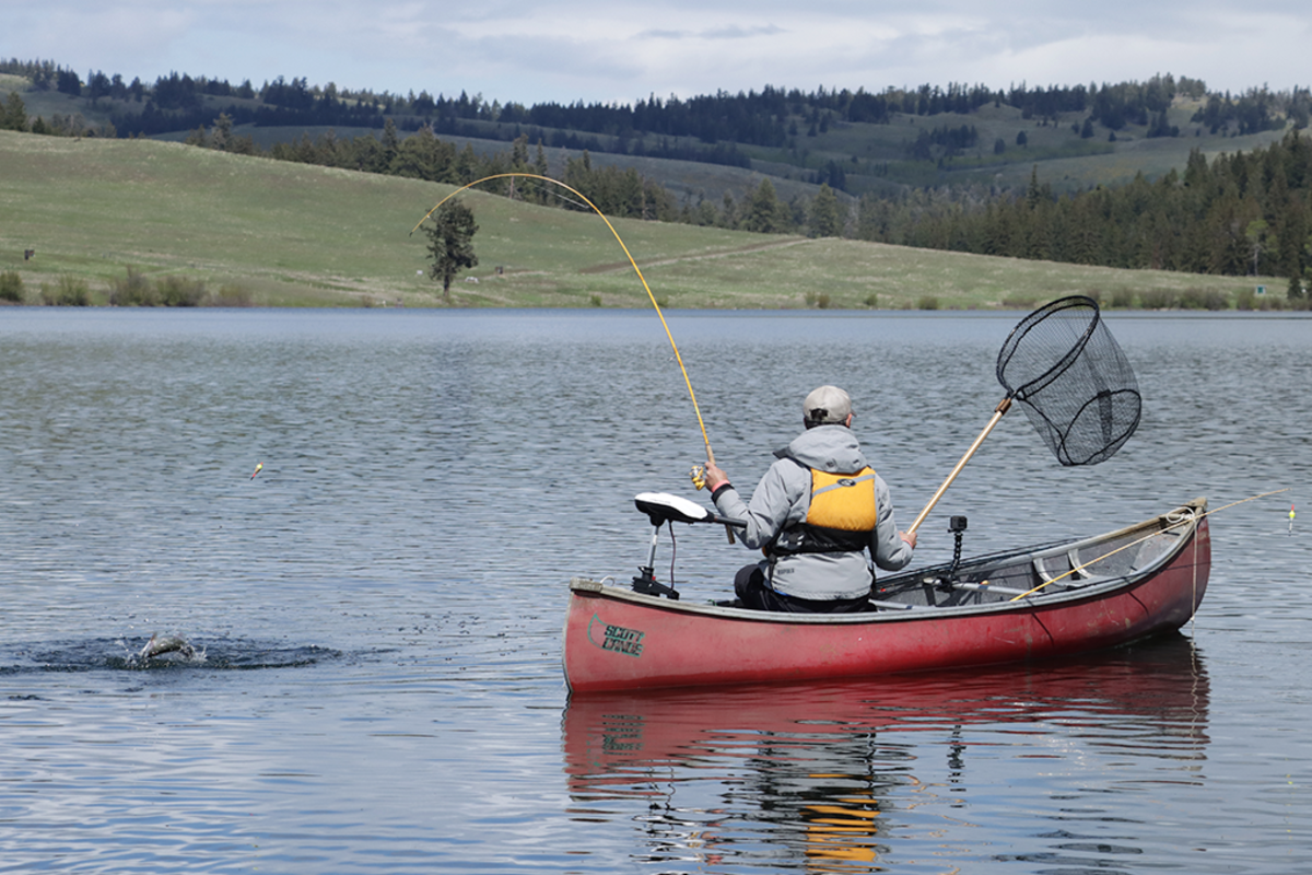 Fishing out of a canoe at Edith Lake