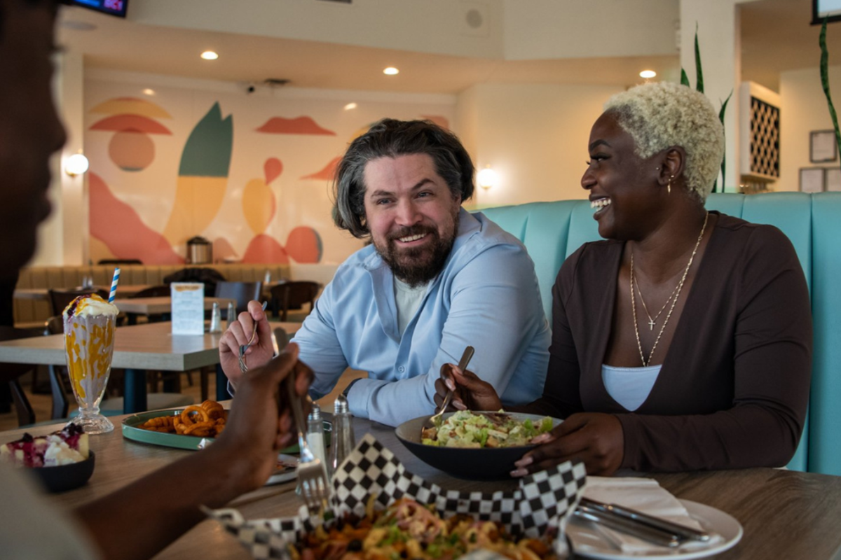 A family enjoying a meal at the Columbia Diner in Kamloops, BC.