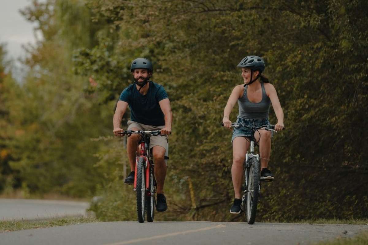 Couple riding bicycles through McArthur Park