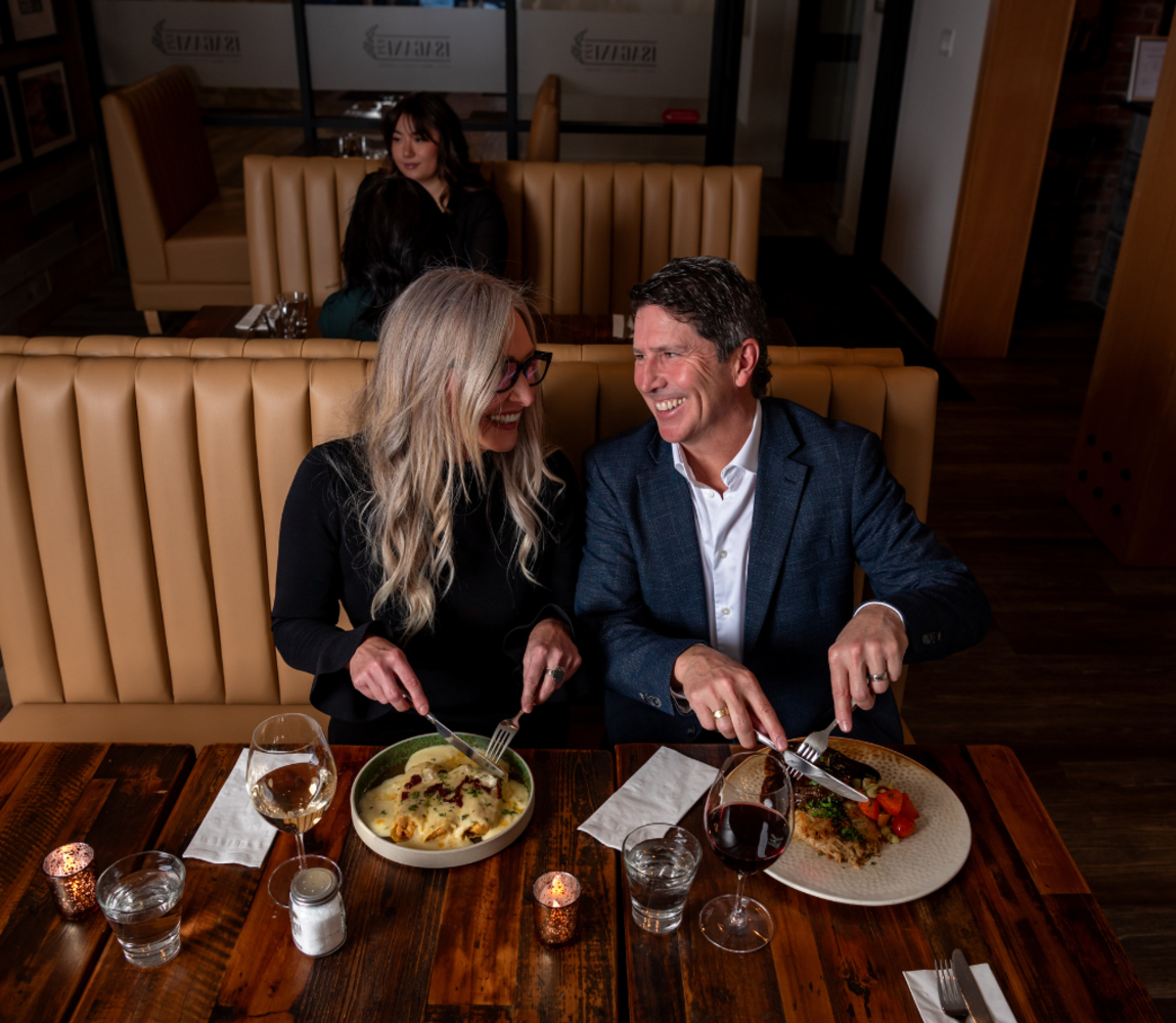 Couple enjoying their meal at Isagani F2T Cafe Lounge in Kamloops, BC