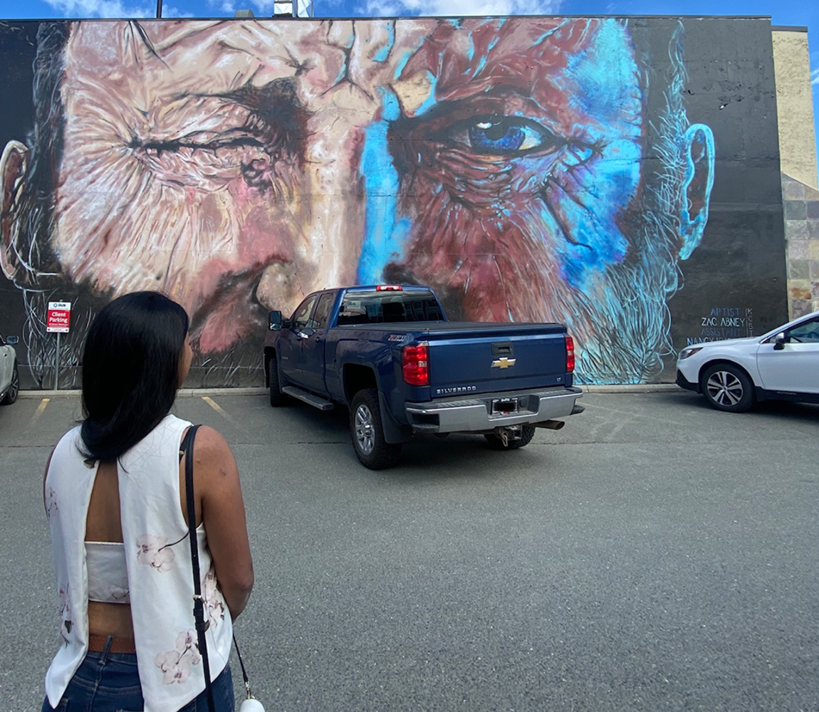 Admiring the Winking Man Back Alley Art Mural in Downtown Kamloops