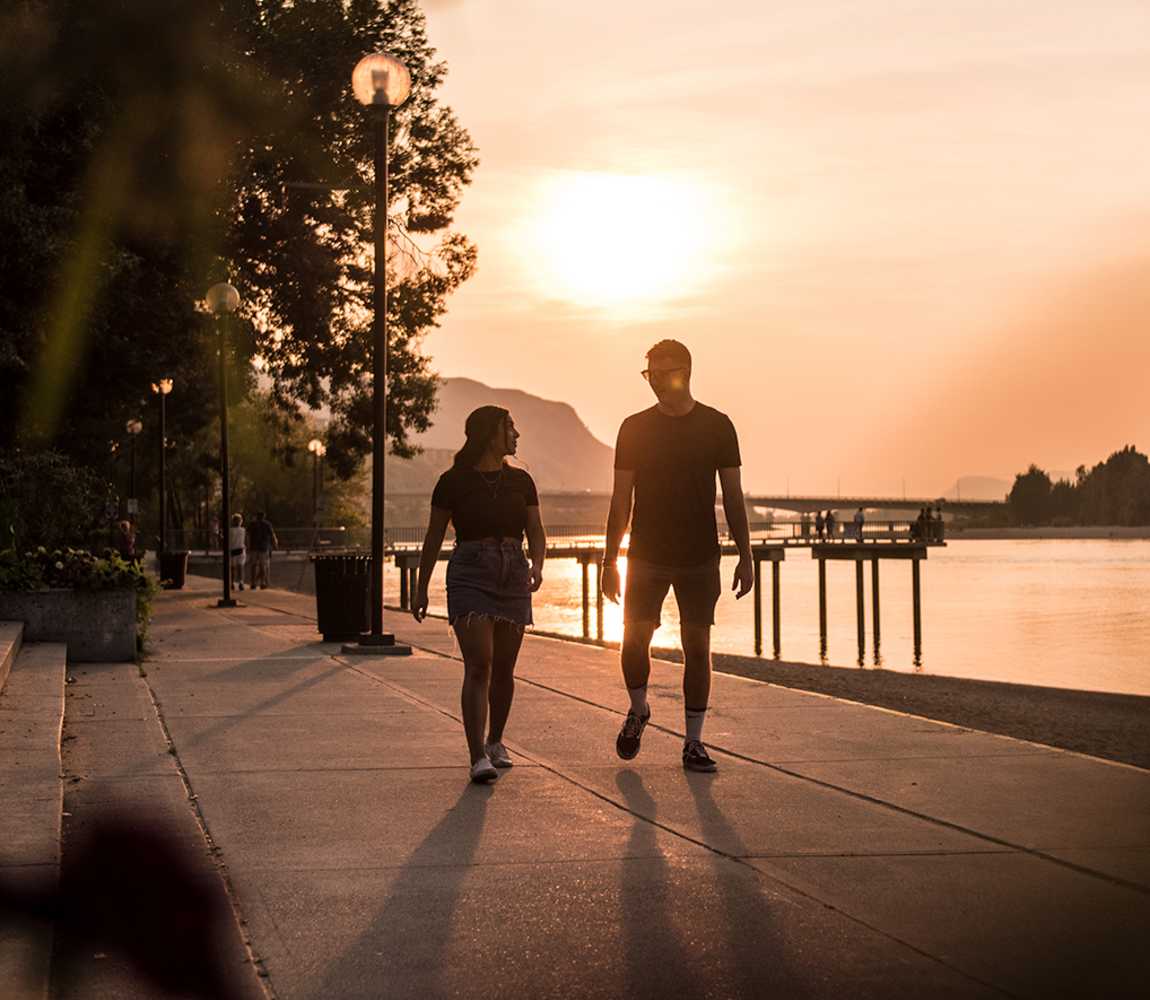 Walking at Riverside Park at sunset