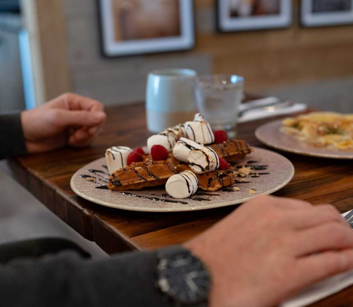 Chocolate drizzled waffles at Isagani Farm to Table Restaurant located in Kamloops, British Columbia