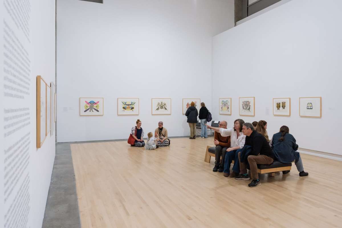 The Kamloops Art Gallery with people admiring the new exhibits.