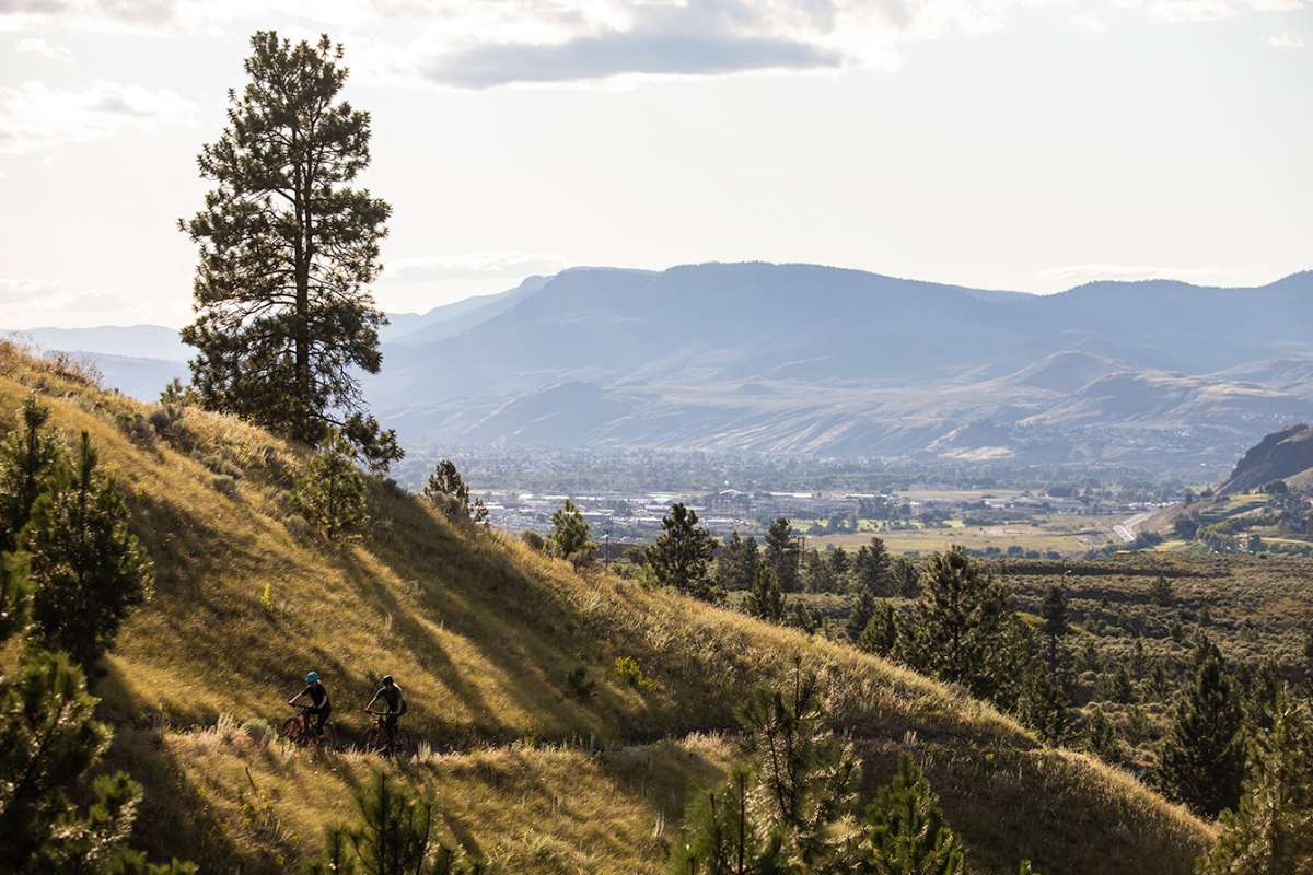 Two people mountain biking in the Kamloops Bike Ranch