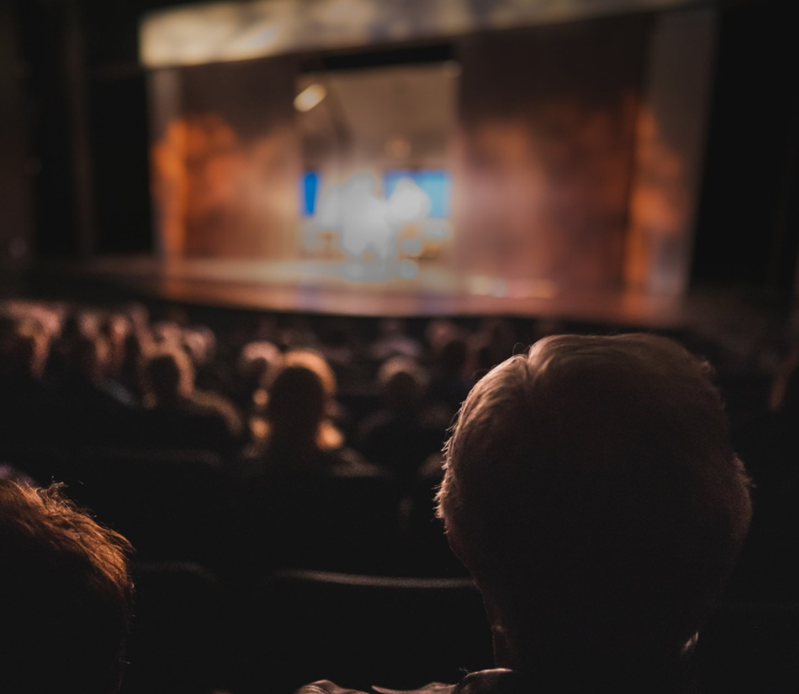 Crowd in a Kamloops Theatre watching a live theatre production.