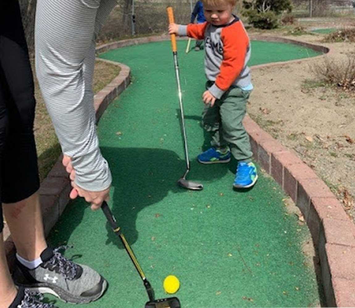 Playing mini-golf at McArthur Island