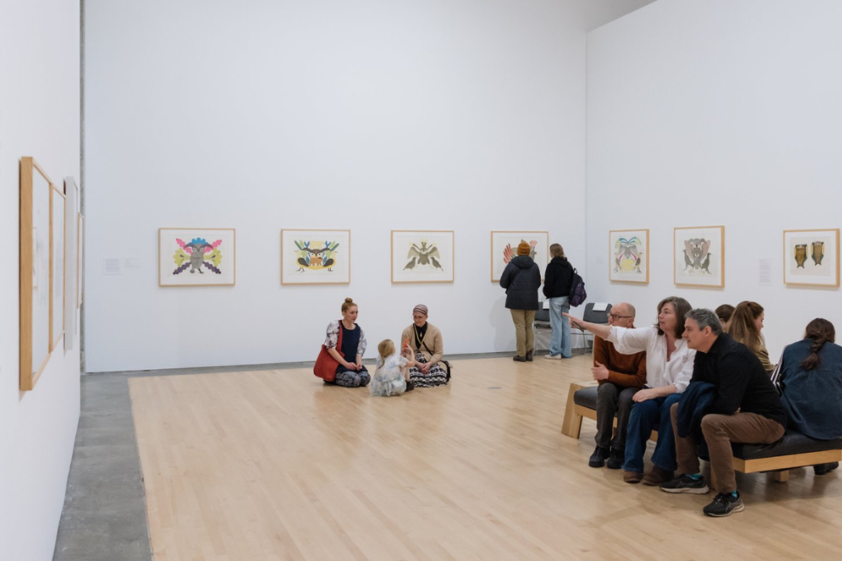 Spectators enjoying the exhibit at Kamloops Art Gallery in BC.