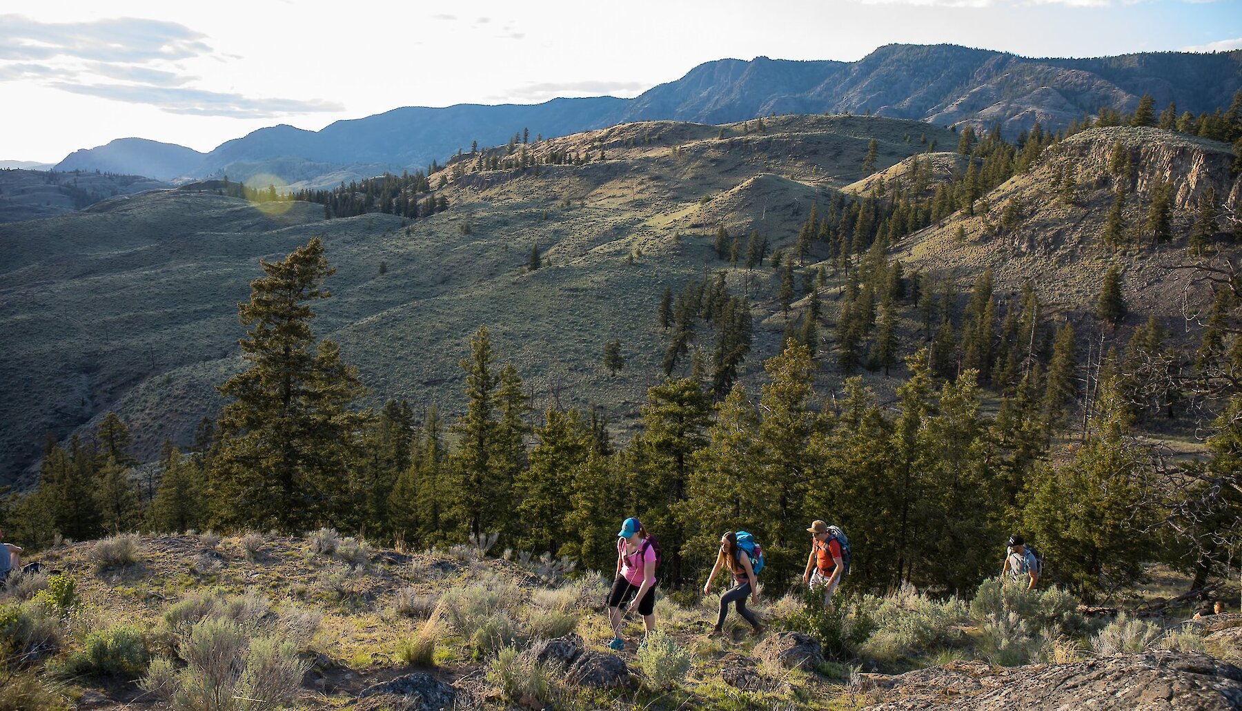 Group hiking up Battle Bluff Trail in Kamloops, BC