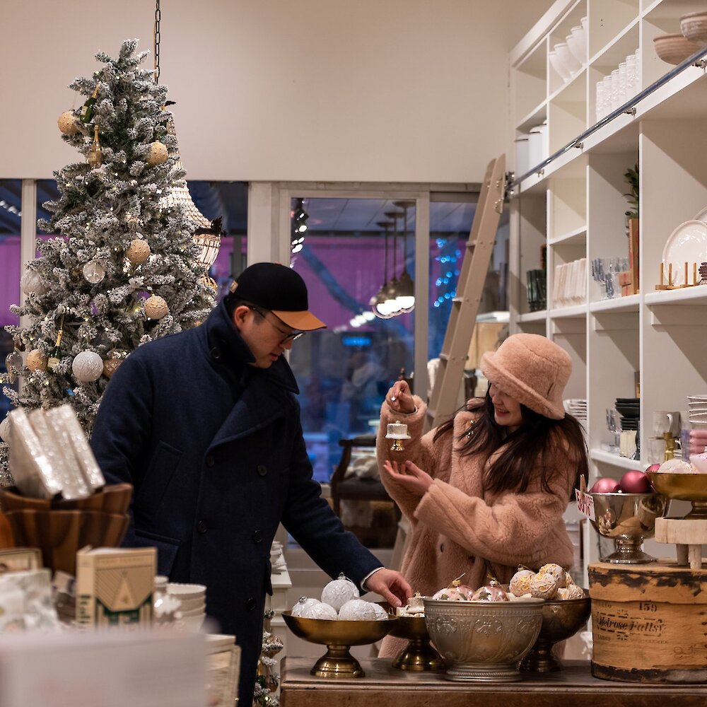 Couple holiday shopping at Jardines in downtown Kamloops, BC.