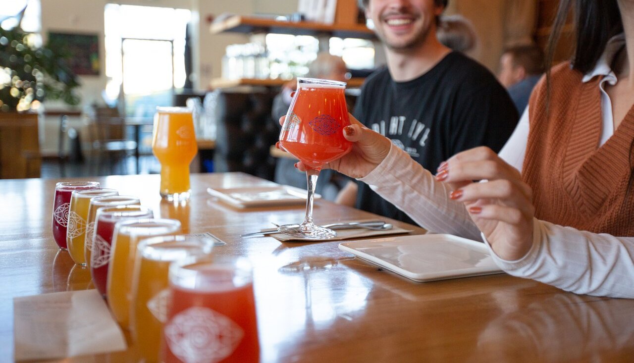 An assortment of beer samplers line the bar at Bright Eye Brewing in Kamloops, BC.