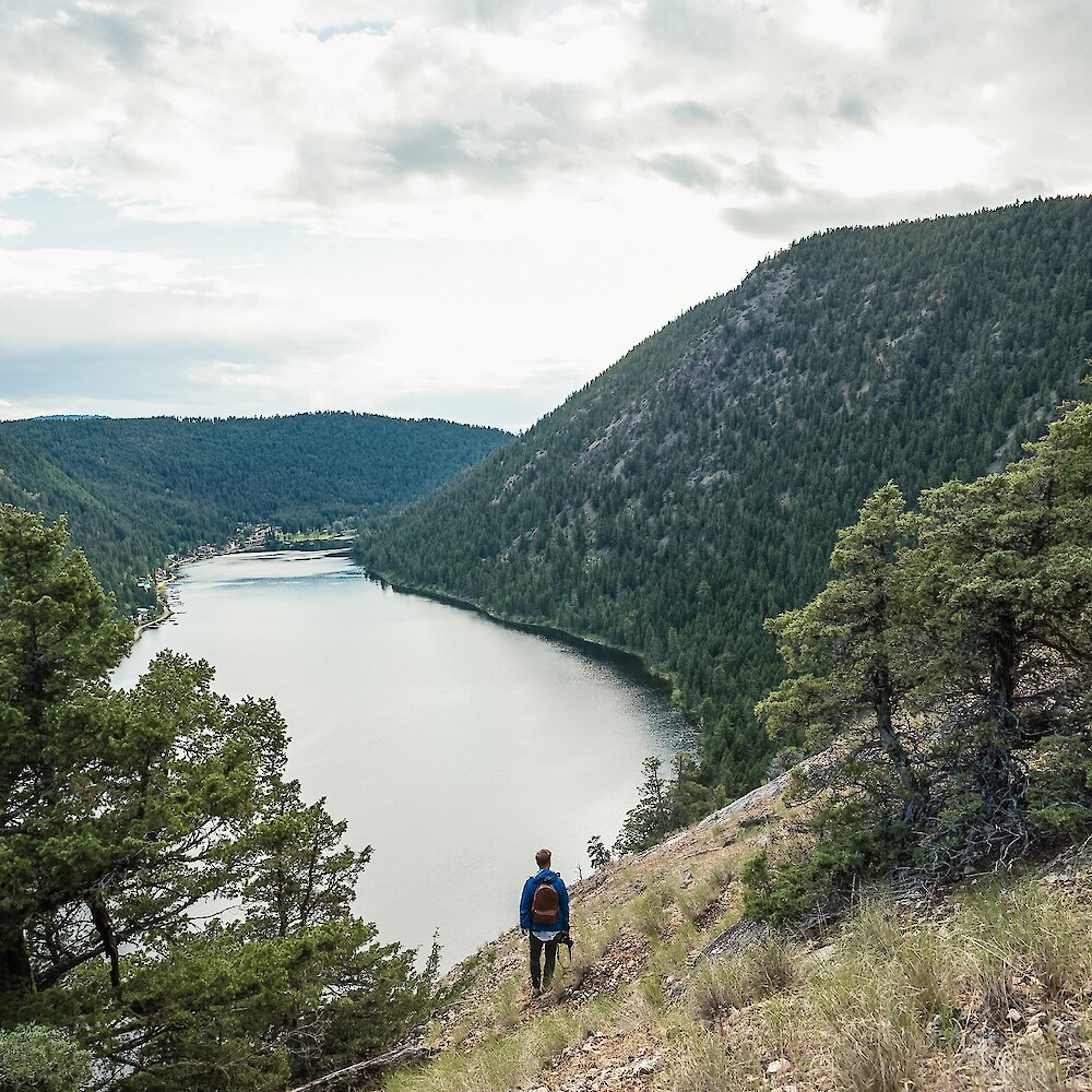 Hiker overlooking Paul Lake in Kamloops, BC.