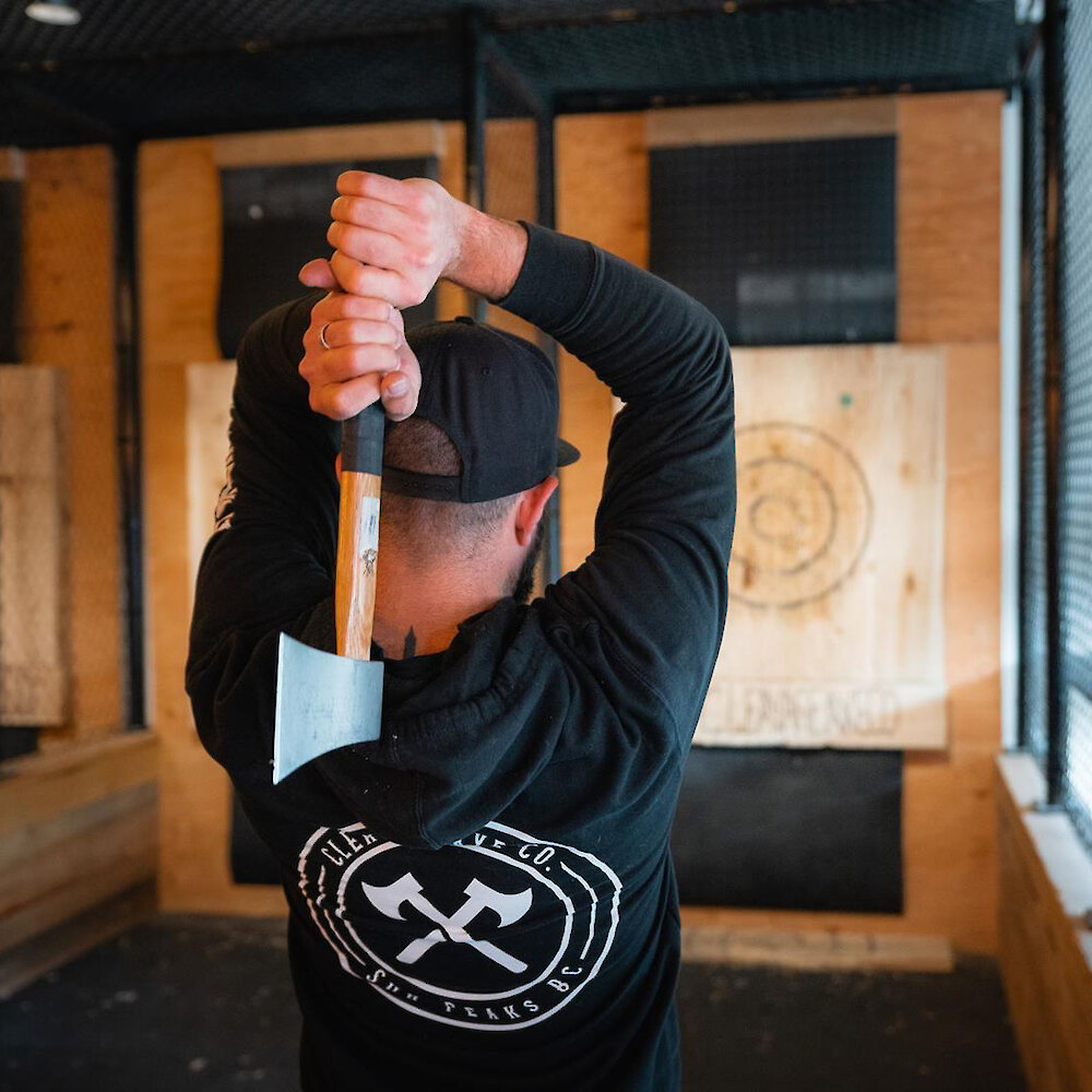 Axe Throwing at Cleavage Axe Co located at Sun Peaks Resort near Kamloops, British Columbia.