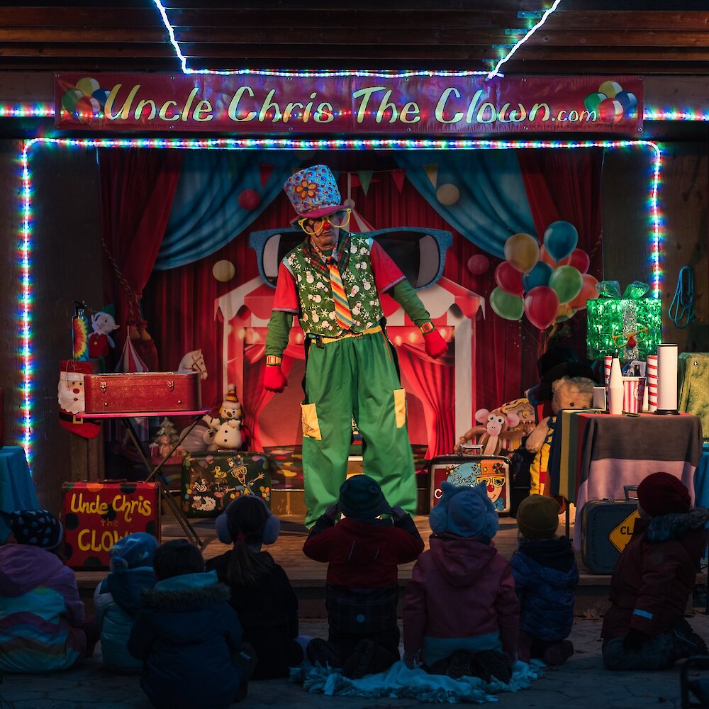 Uncle Chris the Clown performing during Wildlights at the BC Widlife Park near Kamloops, BC.