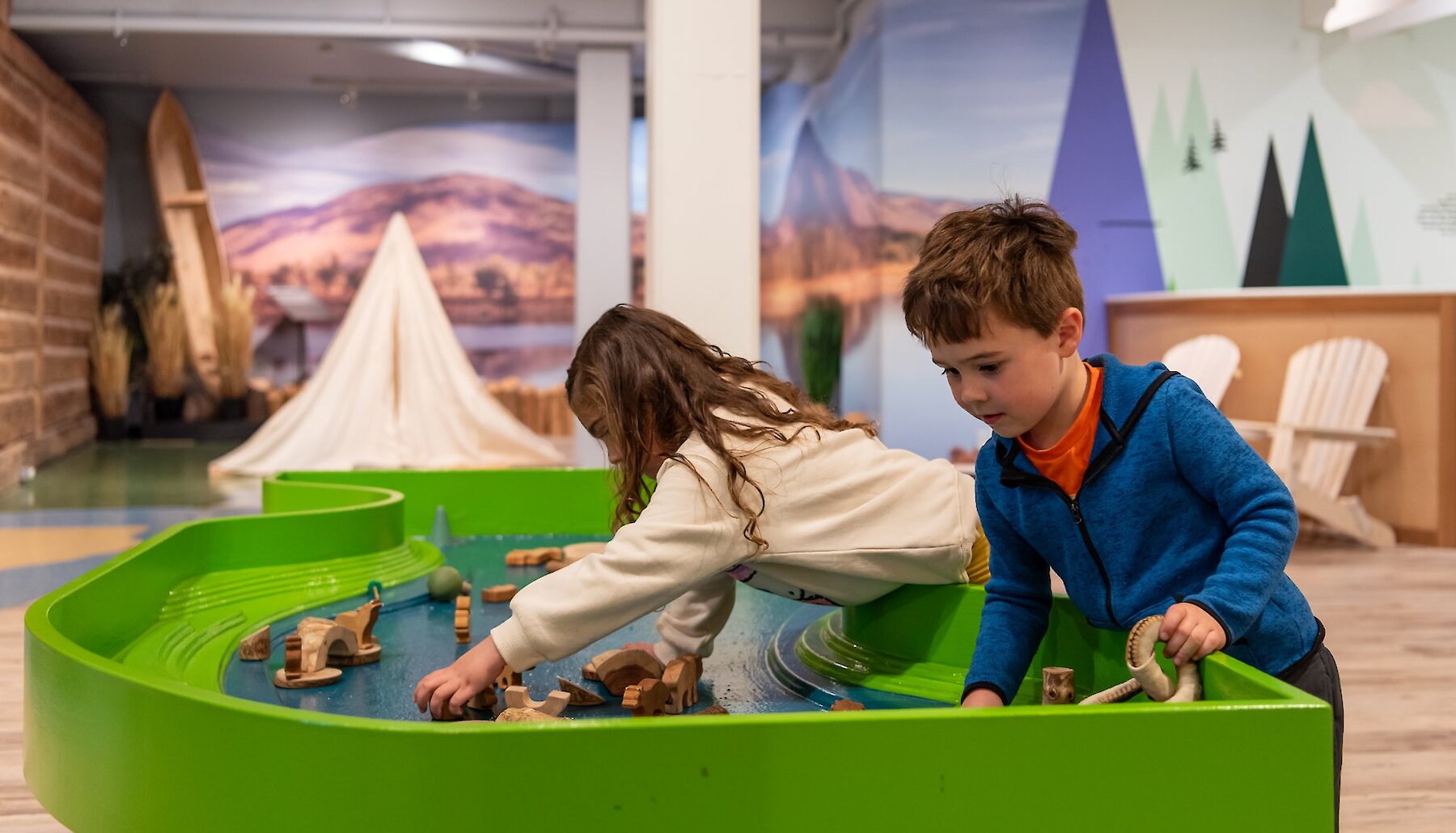 Kids playing with the interactive exhibits at the Children's Museum at Kamloops Museum and Archives located in downtown.