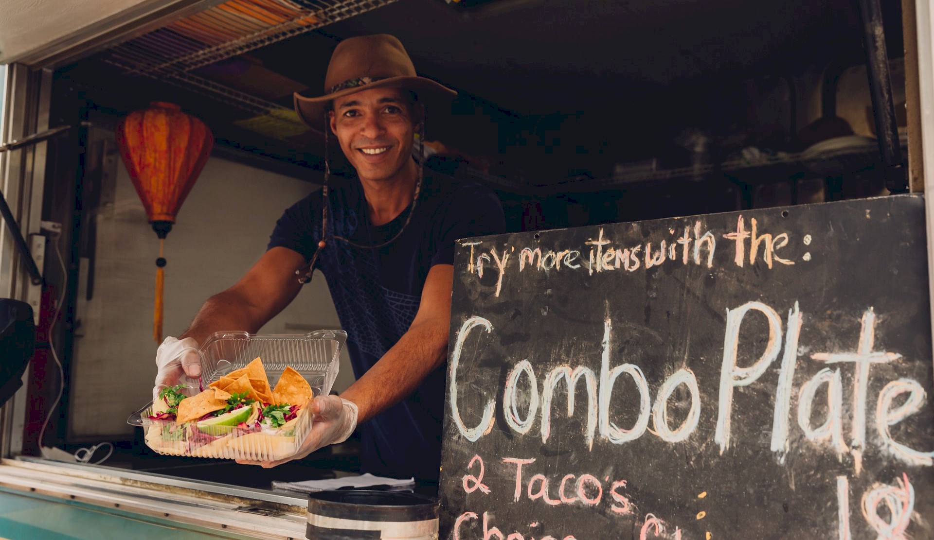 A chef shows off his tacos